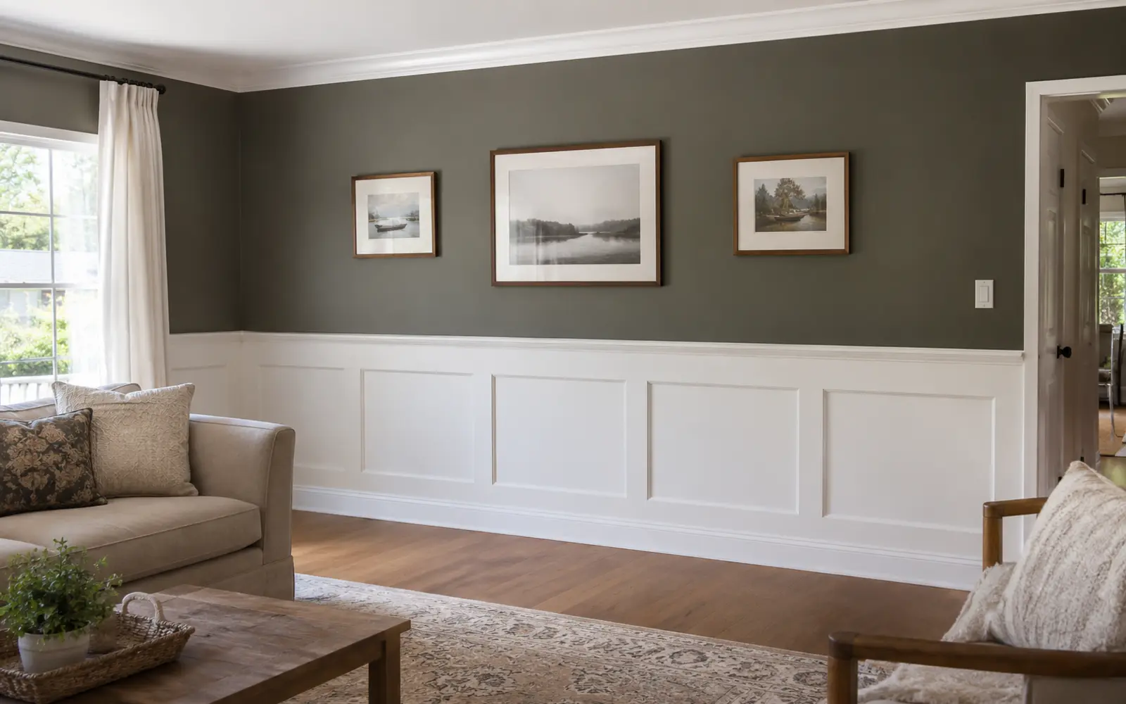 Finished room with wainscoting and an accent wall